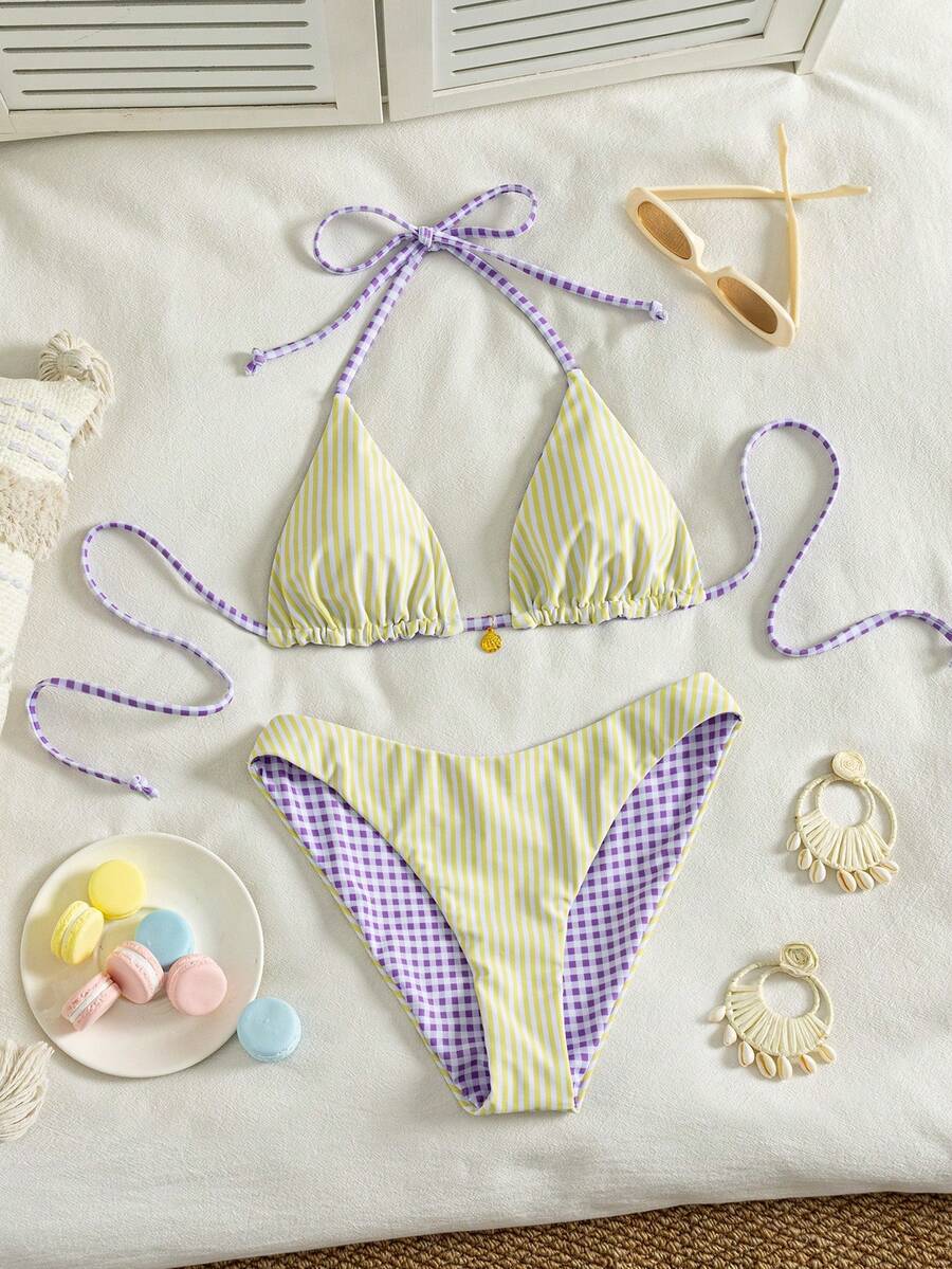 Women's black textured plaid 2-piece bikini set featuring a halter neckline, wireless triangle cups with removable padding, and mid-waist bottoms.