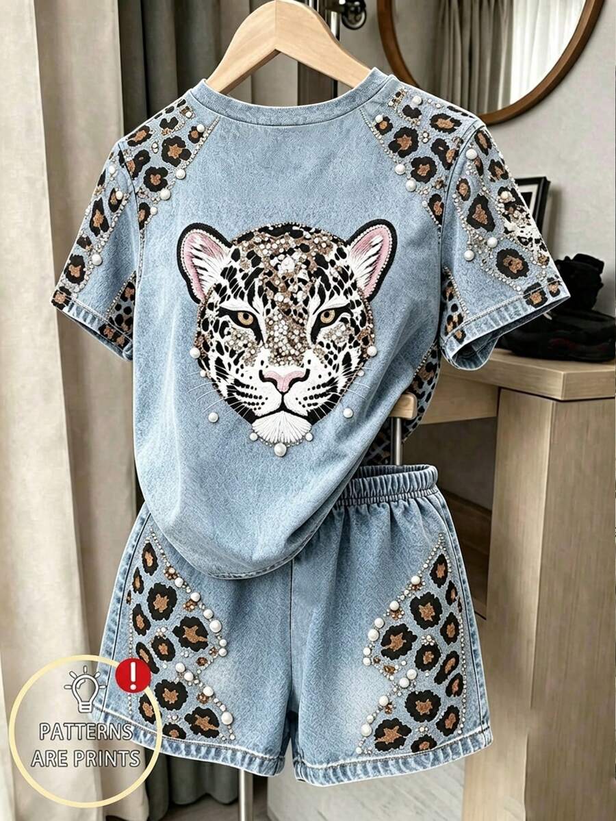 Girls' multicolor short sleeve T-shirt and shorts set featuring a cute cherry and bow print with round neck top and matching shorts.