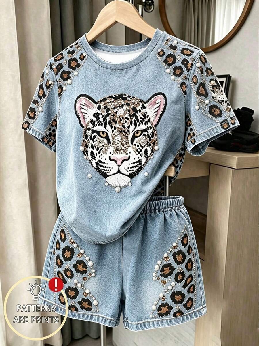 Girls' multicolor short sleeve T-shirt and shorts set featuring a cute cherry and bow print with round neck top and matching shorts.
