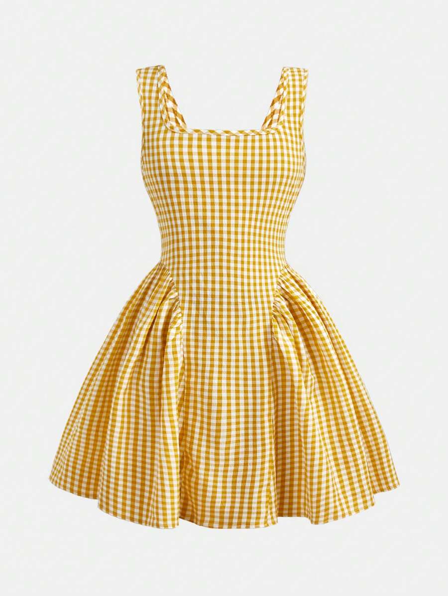 Black and white polka dot sleeveless A-line dress for tween girls featuring a scoop neck, high waist, and flared hem.
