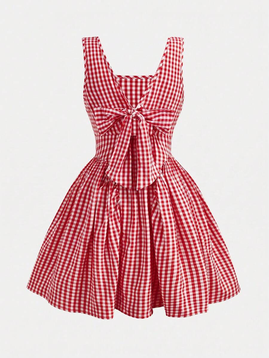 Black and white polka dot sleeveless A-line dress for tween girls featuring a scoop neck, high waist, and flared hem.