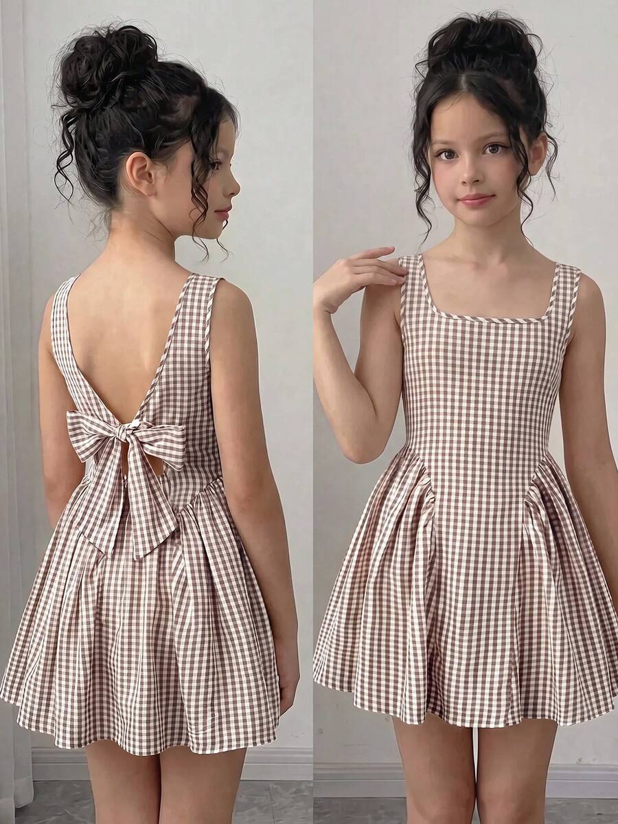 Black and white polka dot sleeveless A-line dress for tween girls featuring a scoop neck, high waist, and flared hem.