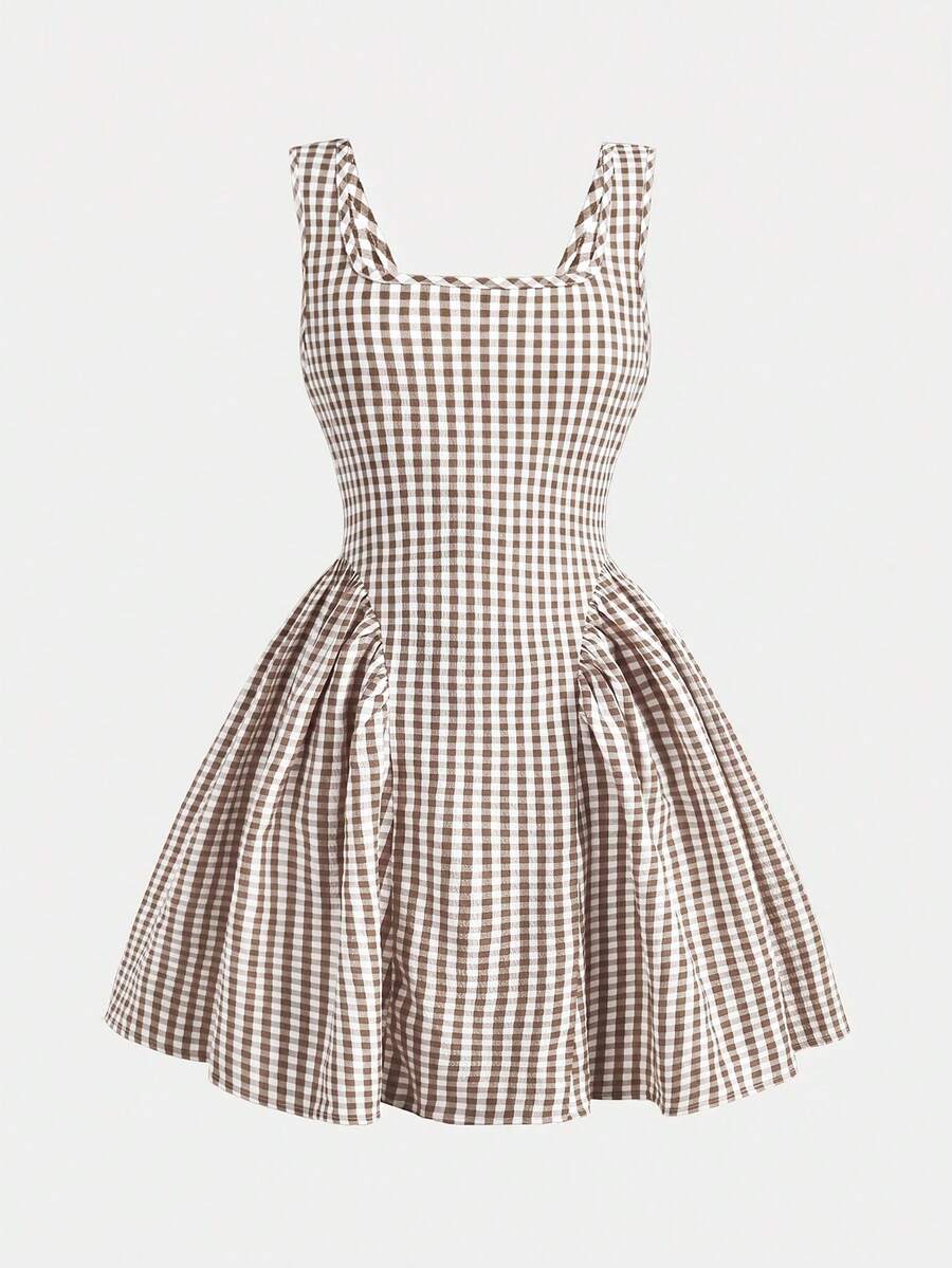 Black and white polka dot sleeveless A-line dress for tween girls featuring a scoop neck, high waist, and flared hem.