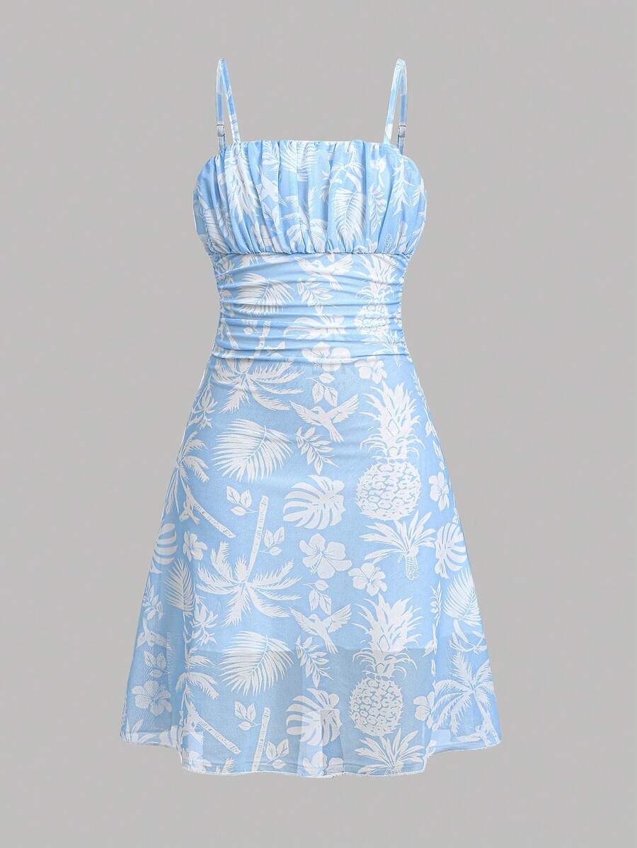 Yellow sleeveless tween girls cami dress with spaghetti straps, ruched bust, shirred details, high waist, and flared short A-line hem for vacation wear.
