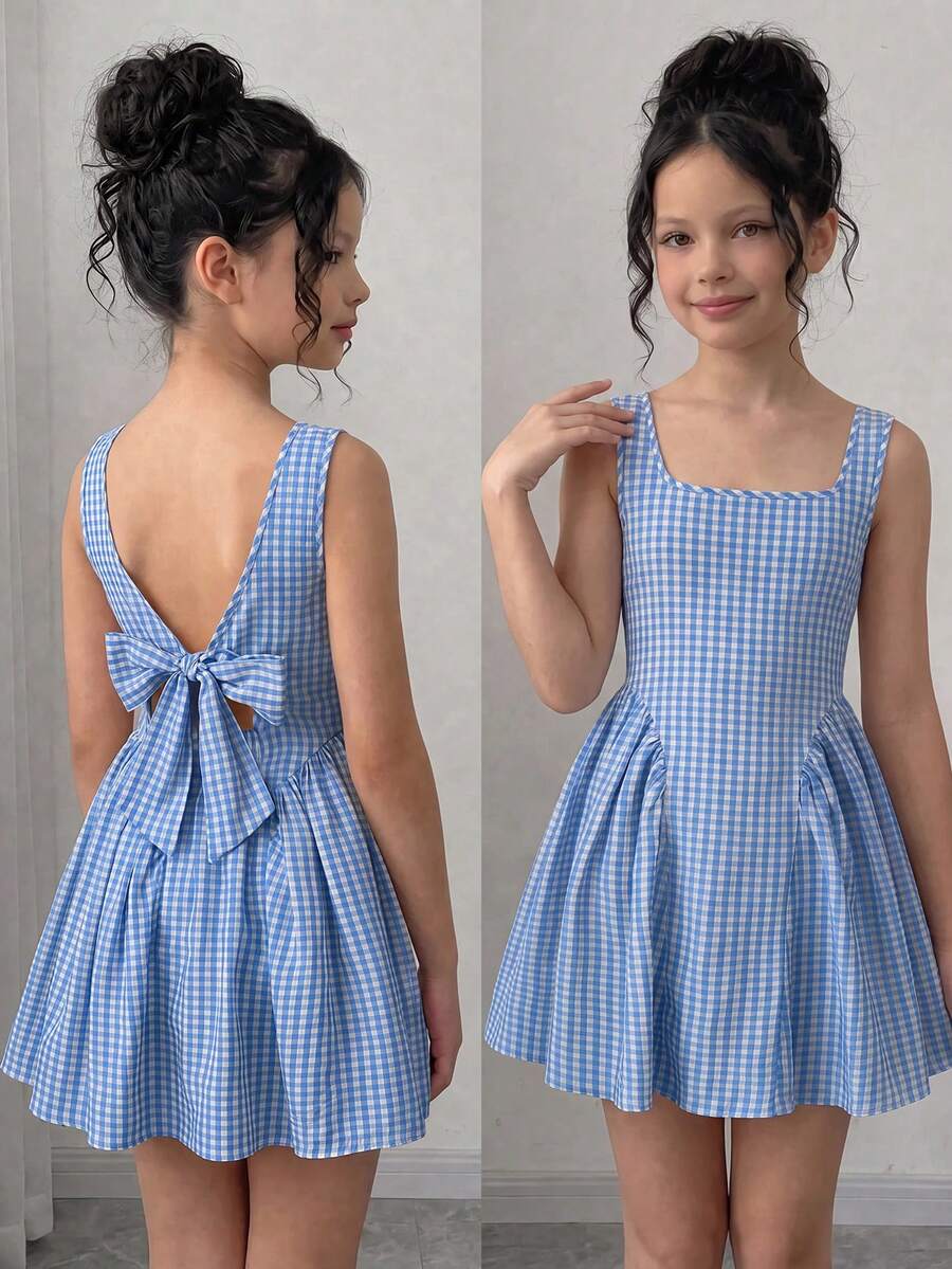 Black and white polka dot sleeveless A-line dress for tween girls featuring a scoop neck, high waist, and flared hem.