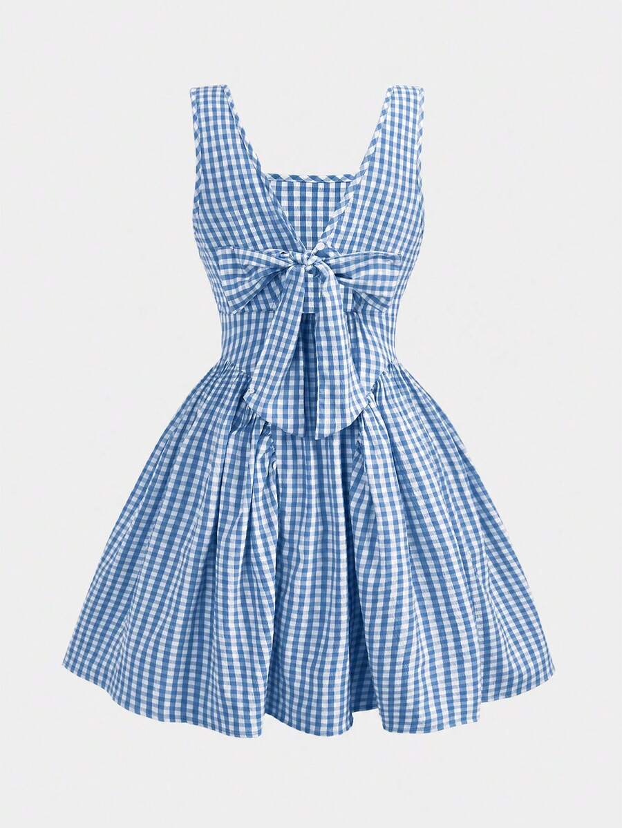 Black and white polka dot sleeveless A-line dress for tween girls featuring a scoop neck, high waist, and flared hem.