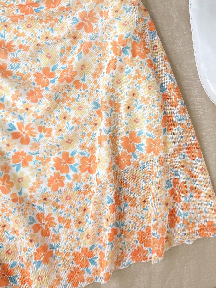 Yellow sleeveless tween girls cami dress with spaghetti straps, ruched bust, shirred details, high waist, and flared short A-line hem for vacation wear.