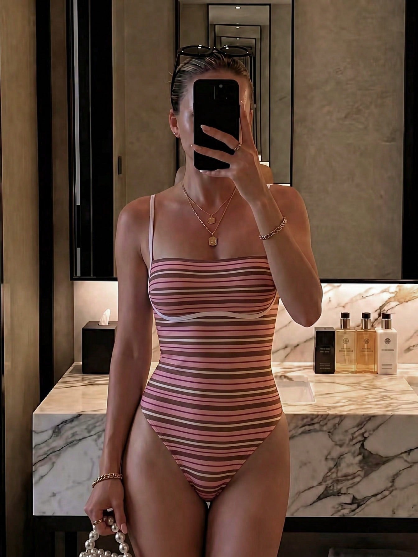 Black colorblock women's one-piece swimsuit with spaghetti straps and high stretch fabric.