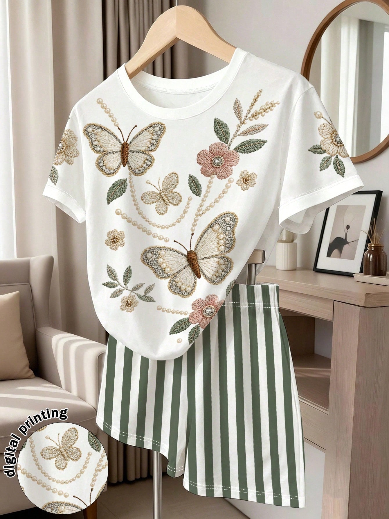 Girls' multicolor short sleeve T-shirt and shorts set featuring a cute cherry and bow print with round neck top and matching shorts.