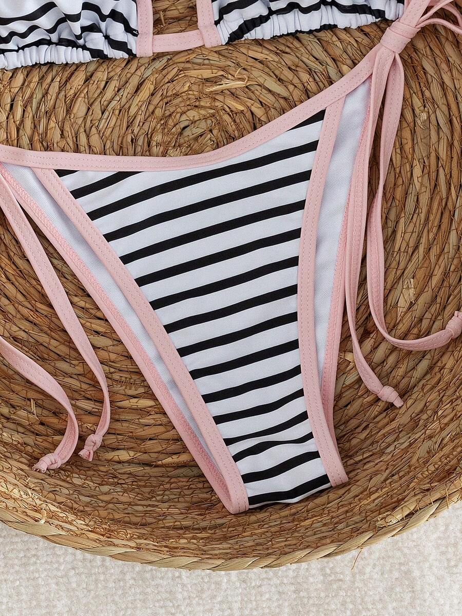 Women's two-piece halter triangle bikini set featuring a backless tie-back top with removable padding and matching tie-side mid-waist bottoms.