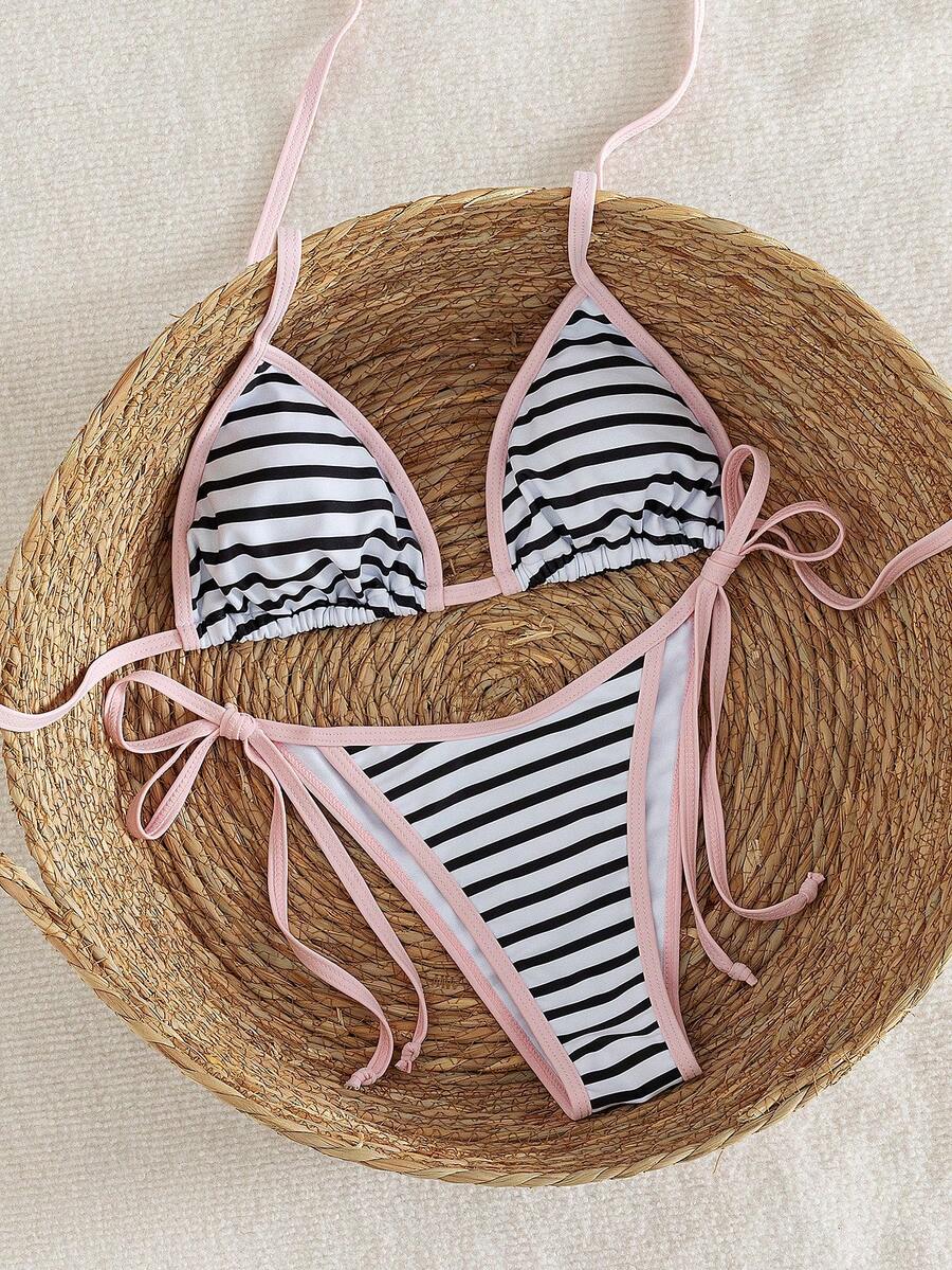 Women's two-piece halter triangle bikini set featuring a backless tie-back top with removable padding and matching tie-side mid-waist bottoms.