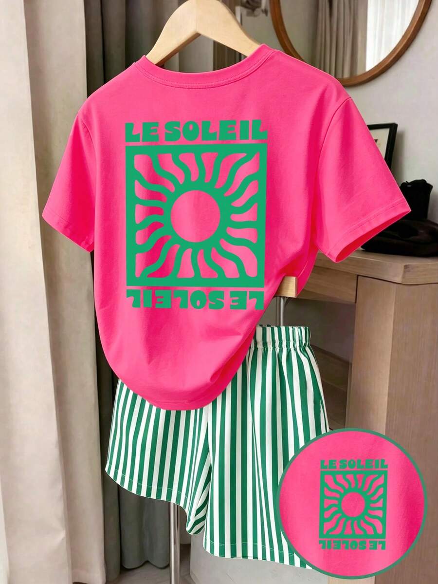 Girls' multicolor short sleeve T-shirt and shorts set featuring a cute cherry and bow print with round neck top and matching shorts.