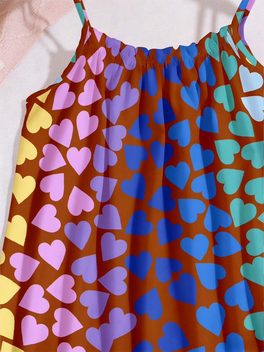 Multicolor geometric print cami midi dress for tween girls featuring spaghetti straps and a flared hem.