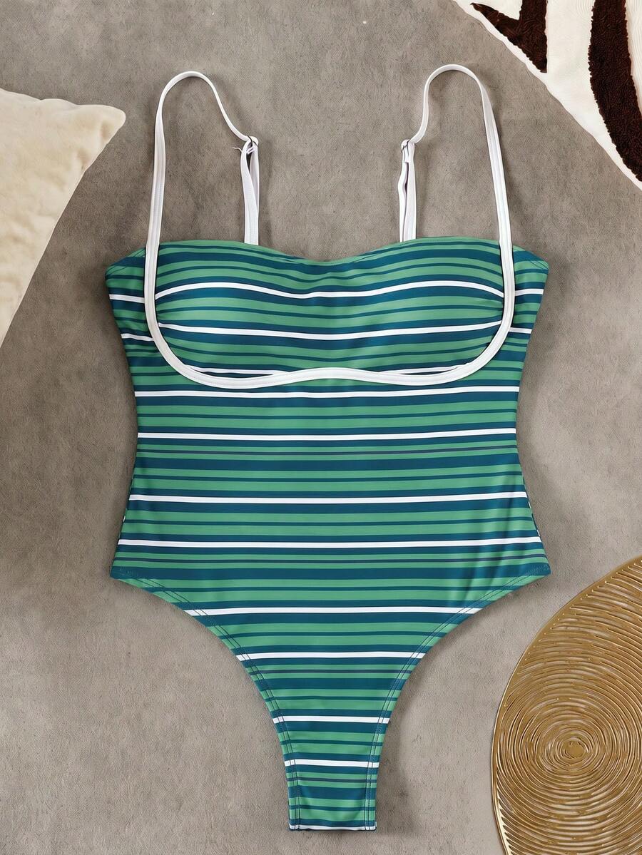 Black colorblock women's one-piece swimsuit with spaghetti straps and high stretch fabric.