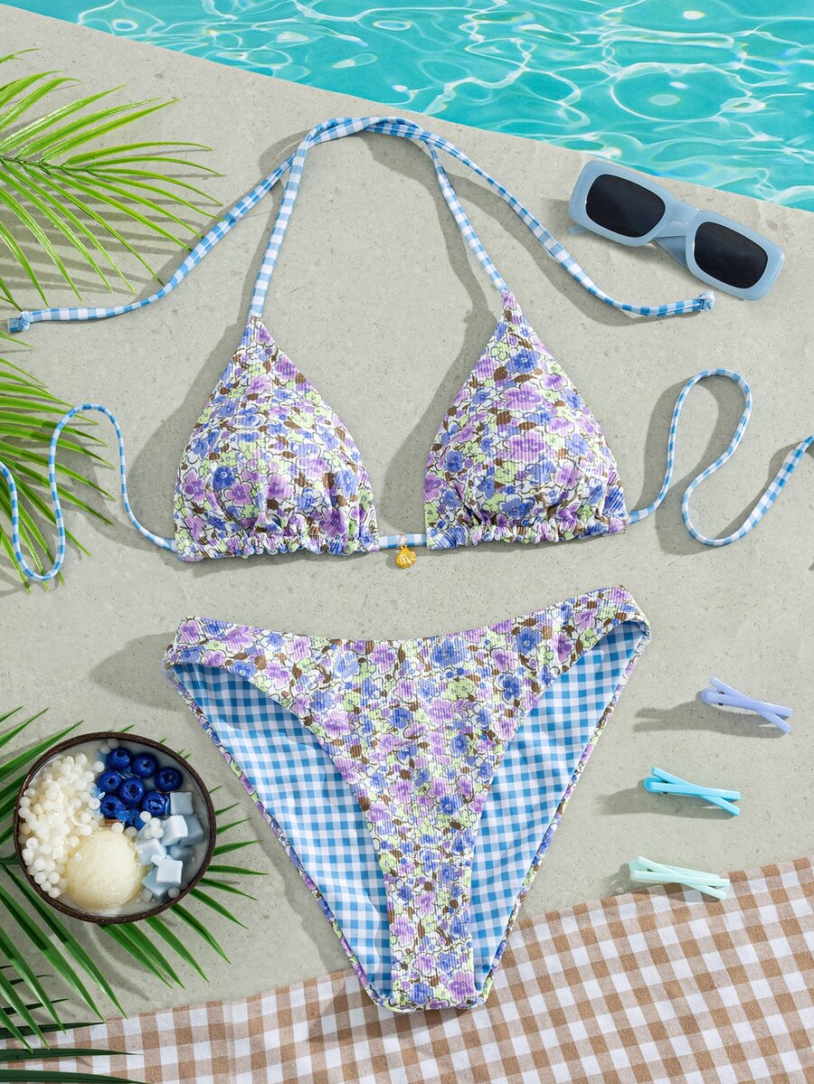 Women's black textured plaid 2-piece bikini set featuring a halter neckline, wireless triangle cups with removable padding, and mid-waist bottoms.