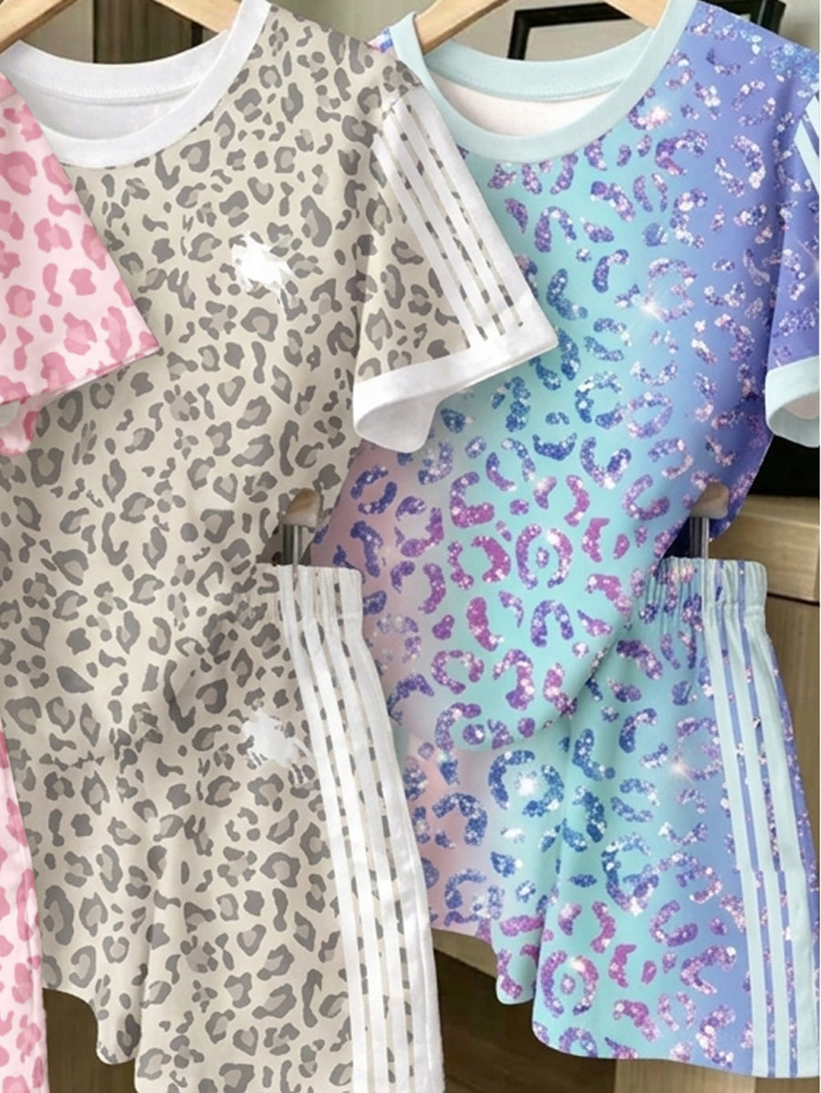 Girls' multicolor short sleeve T-shirt and shorts set featuring a cute cherry and bow print with round neck top and matching shorts.