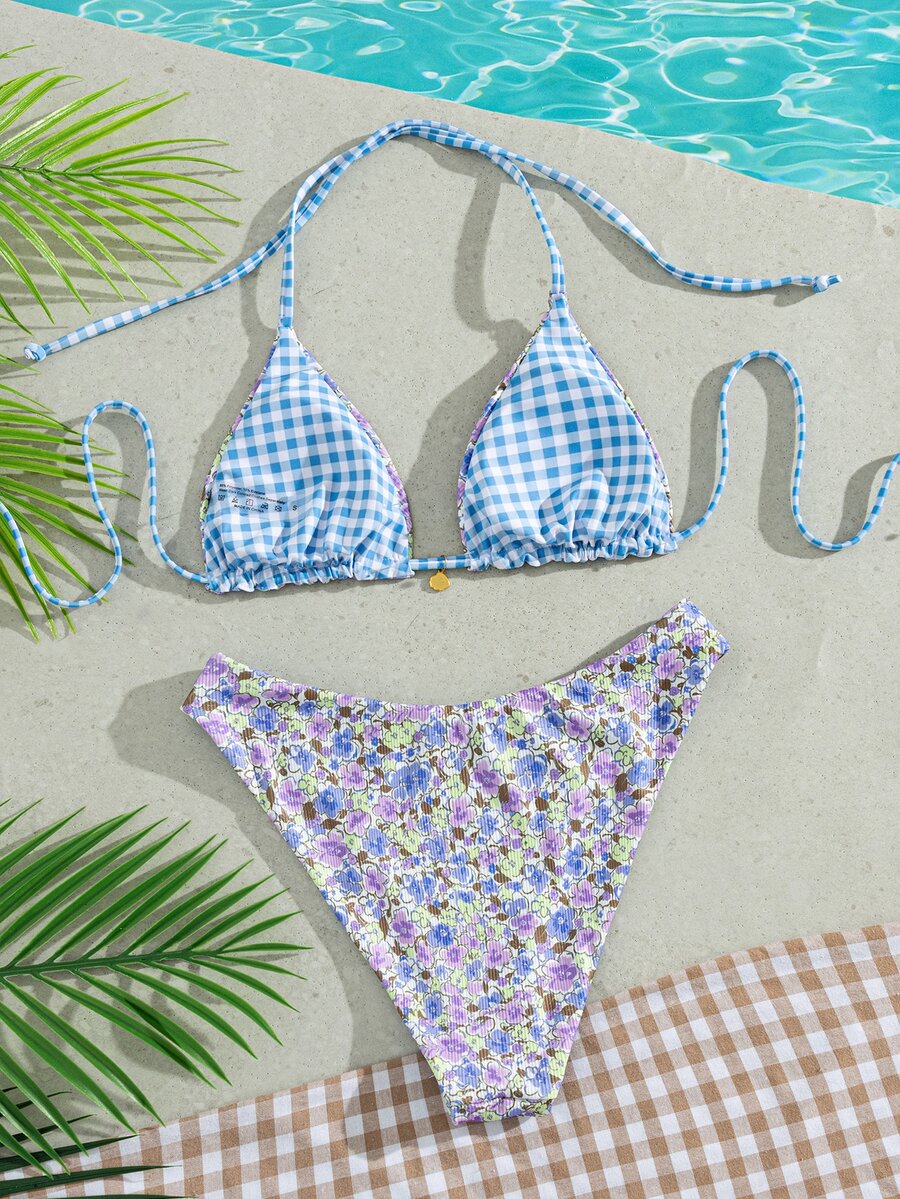 Women's black textured plaid 2-piece bikini set featuring a halter neckline, wireless triangle cups with removable padding, and mid-waist bottoms.