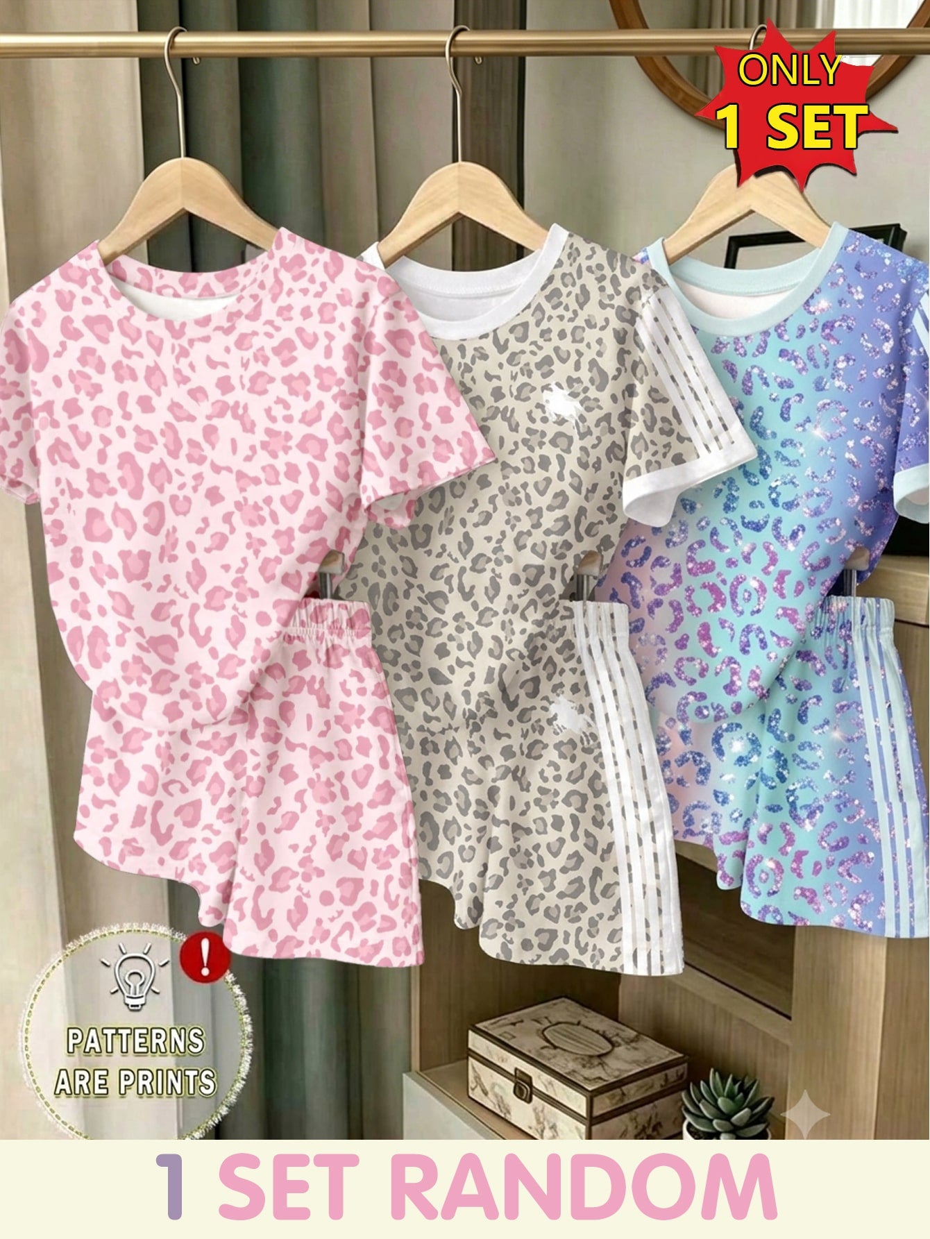 Girls' multicolor short sleeve T-shirt and shorts set featuring a cute cherry and bow print with round neck top and matching shorts.