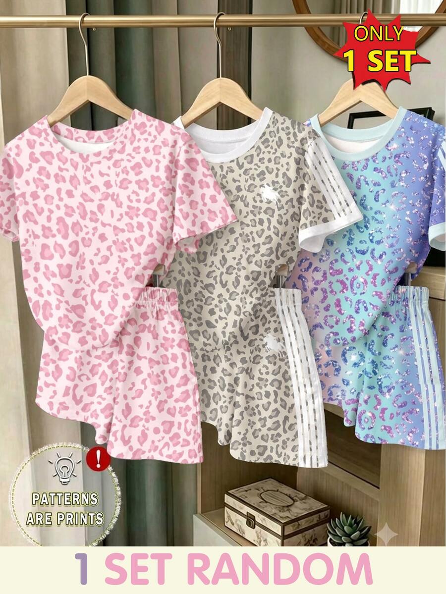 Girls' multicolor short sleeve T-shirt and shorts set featuring a cute cherry and bow print with round neck top and matching shorts.