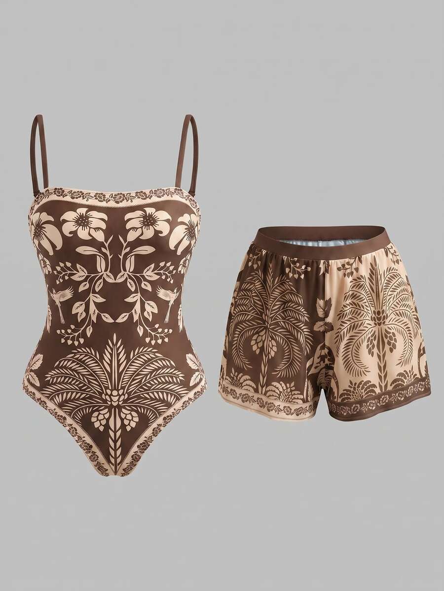 Swim Oasis women's tropical palm tree print army green one-piece swimsuit featuring spaghetti straps, removable padding, and matching shorts for beach vacations.