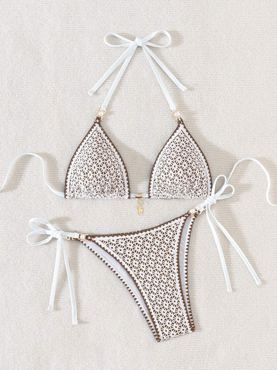 Women's triangle bikini set with contrast lace wireless bra top and ultra high waist tie side bottoms.