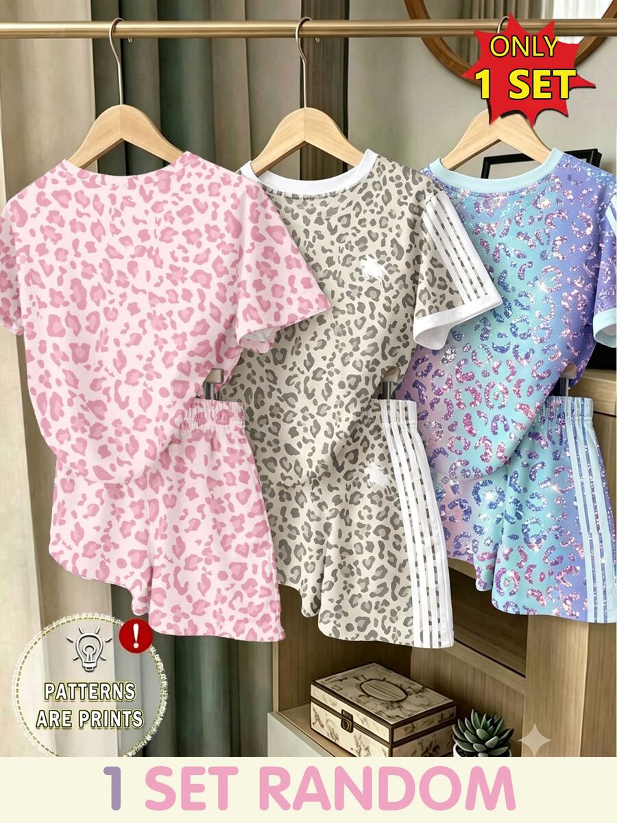 Girls' multicolor short sleeve T-shirt and shorts set featuring a cute cherry and bow print with round neck top and matching shorts.