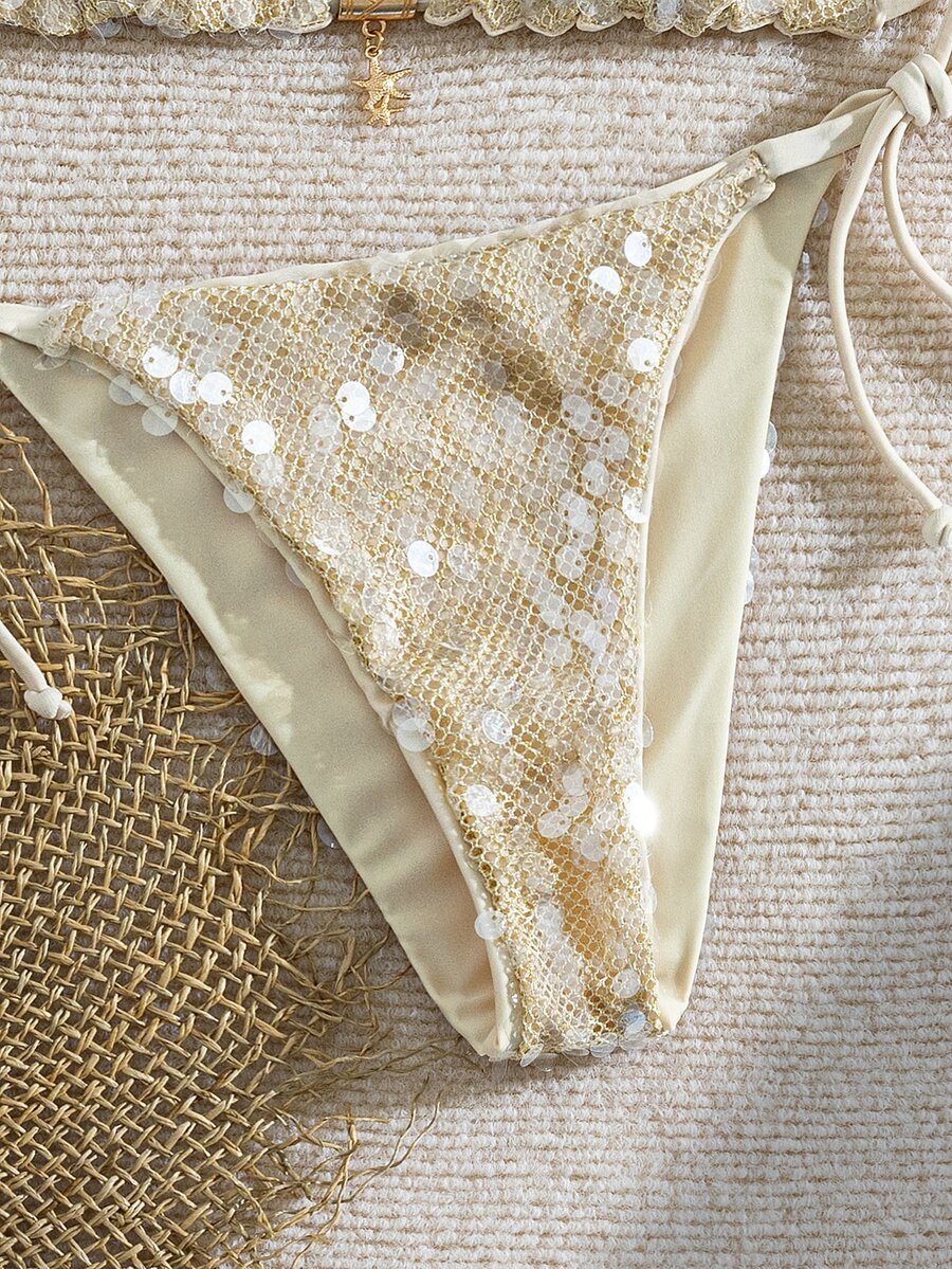 Beige Y2K triangle bikini set featuring a deep V-neck halter top with knot details and removable padding paired with low waist cheeky bottoms.