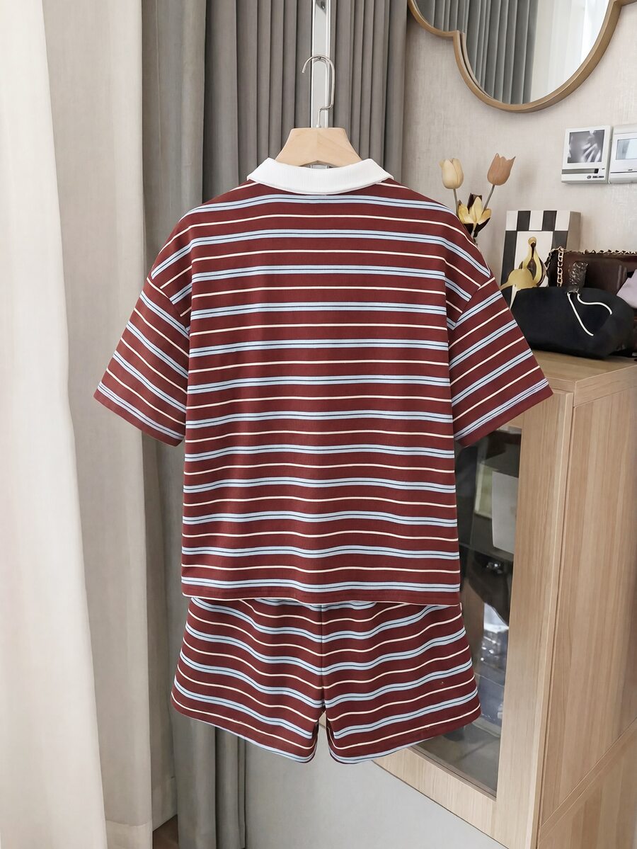 Tween girl wearing a black and white striped drop-shoulder crew neck t-shirt with bow embroidery paired with matching tie-waist shorts.